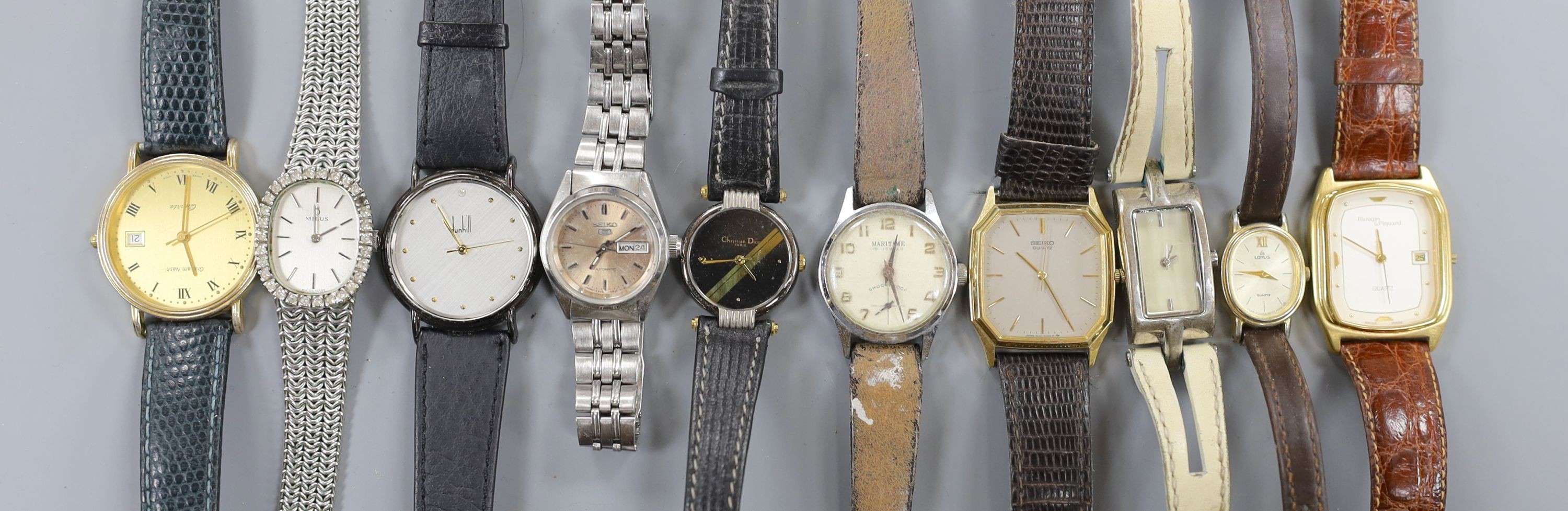 A Dunhill Swiss quartz wrist watch and nine other assorted lady's and gentleman's modern wrist watches including Seiko.